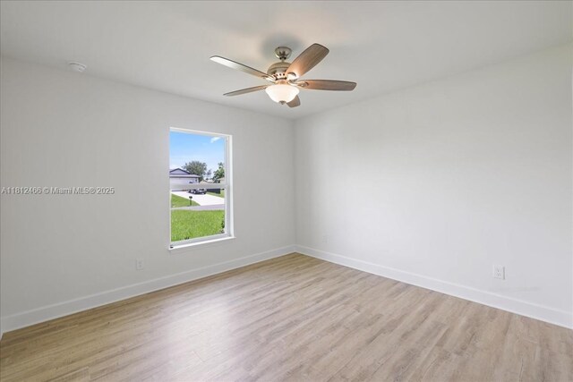 1119 NW 19th St, Cape Coral, FL 33993 - unfurnished room featuring light wood finished floors, ceiling fan, and a smoke detector