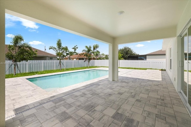 1119 NW 19th St, Cape Coral, FL 33993 - view of swimming pool with a patio area and a fenced backyard