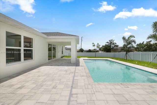 1119 NW 19th St, Cape Coral, FL 33993 - view of swimming pool featuring a patio area and a fenced backyard