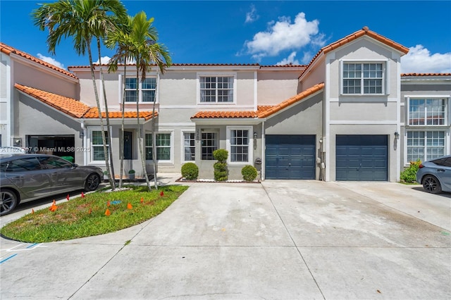 2260 SW 84th Way, Miramar, FL 33025 - multi unit property featuring driveway, stucco siding, a tiled roof, and an attached garage