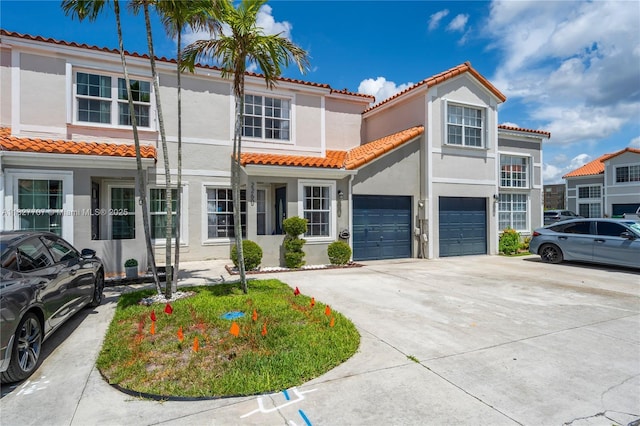 2260 SW 84th Way, Miramar, FL 33025 - view of front of property with stucco siding, a tile roof, driveway, and an attached garage