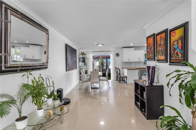 2260 SW 84th Way, Miramar, FL 33025 - hallway featuring crown molding and light tile patterned floors