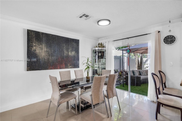 2260 SW 84th Way, Miramar, FL 33025 - dining area featuring ornamental molding and tile patterned flooring