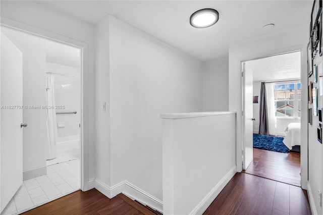 2260 SW 84th Way, Miramar, FL 33025 - corridor with dark wood-type flooring and an upstairs landing