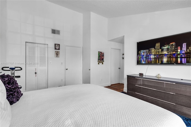 2260 SW 84th Way, Miramar, FL 33025 - bedroom with high vaulted ceiling, a closet, and dark wood finished floors
