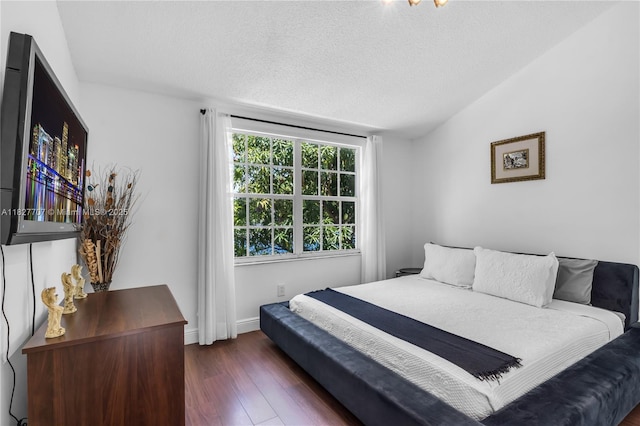 2260 SW 84th Way, Miramar, FL 33025 - bedroom with wood finished floors and a textured ceiling