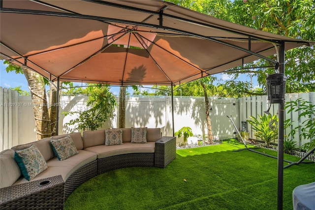 2260 SW 84th Way, Miramar, FL 33025 - fenced backyard featuring a gazebo and an outdoor living space