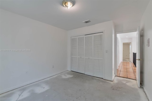 3136 Virginia St, Miami, FL 33133 - unfurnished bedroom with concrete floors and a closet