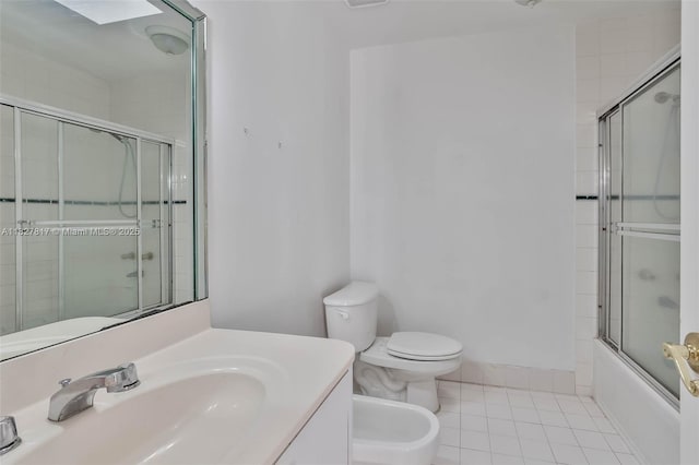 3136 Virginia St, Miami, FL 33133 - bathroom featuring tile patterned floors, a bidet, vanity, and combined bath / shower with glass door