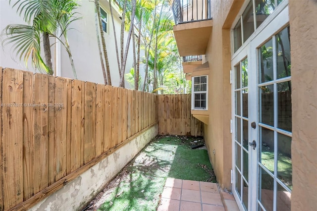 3136 Virginia St, Miami, FL 33133 - view of patio / terrace featuring french doors