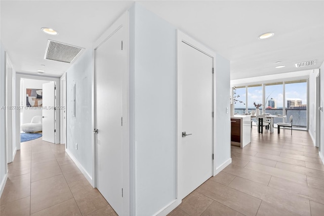 495 Brickell Ave Unit 3901, Miami, FL 33131 - corridor with recessed lighting and light tile patterned floors