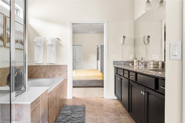 1892 Gobi Dr, Kissimmee, FL 3474 - bathroom featuring vanity, a bath, and tile patterned flooring