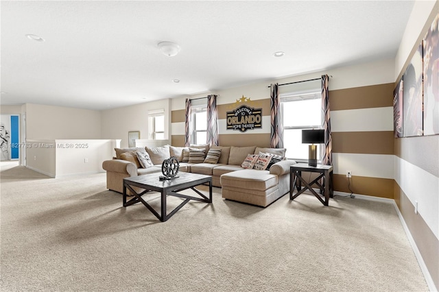1892 Gobi Dr, Kissimmee, FL 3474 - living room with healthy amount of natural light and carpet flooring