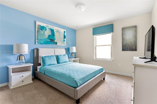 1892 Gobi Dr, Kissimmee, FL 3474 - bedroom with light colored carpet and baseboards