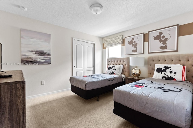 1892 Gobi Dr, Kissimmee, FL 3474 - carpeted bedroom with a closet and a textured ceiling