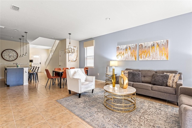 1892 Gobi Dr, Kissimmee, FL 3474 - living area featuring a chandelier and light tile patterned floors