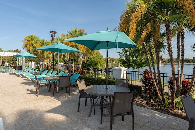 1892 Gobi Dr, Kissimmee, FL 3474 - view of patio / terrace featuring outdoor dining space and a water view