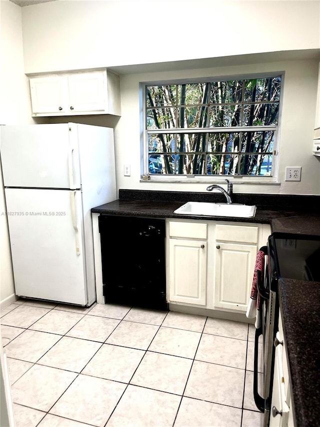 2331 NW 96th Ter Unit 17F, Pembroke Pines, FL 33024 - kitchen with freestanding refrigerator, dishwasher, healthy amount of natural light, and electric range