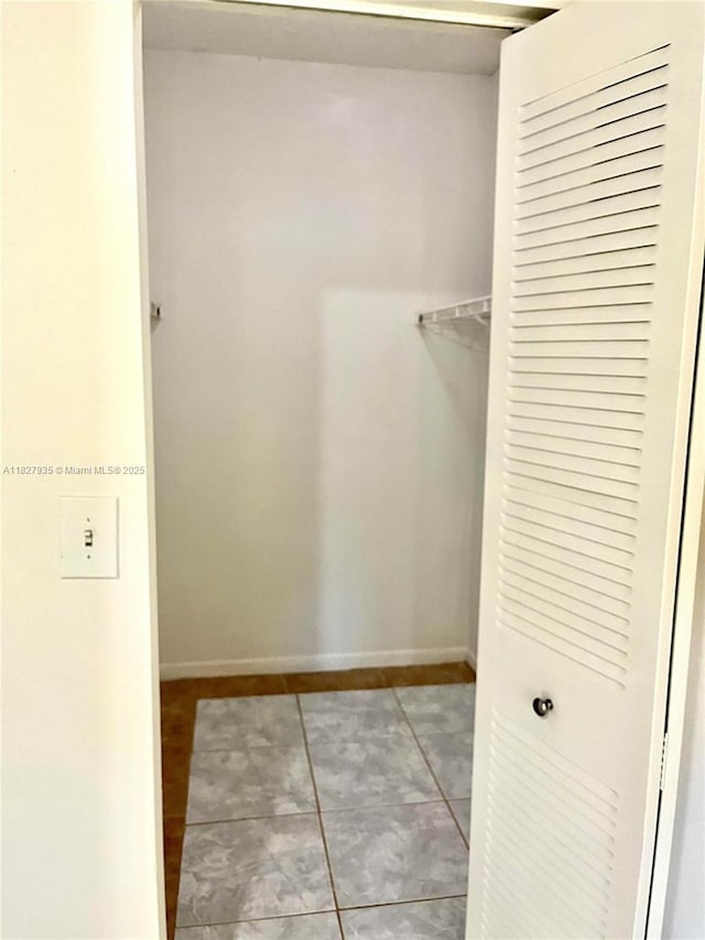 2331 NW 96th Ter Unit 17F, Pembroke Pines, FL 33024 - spacious closet with light tile patterned floors