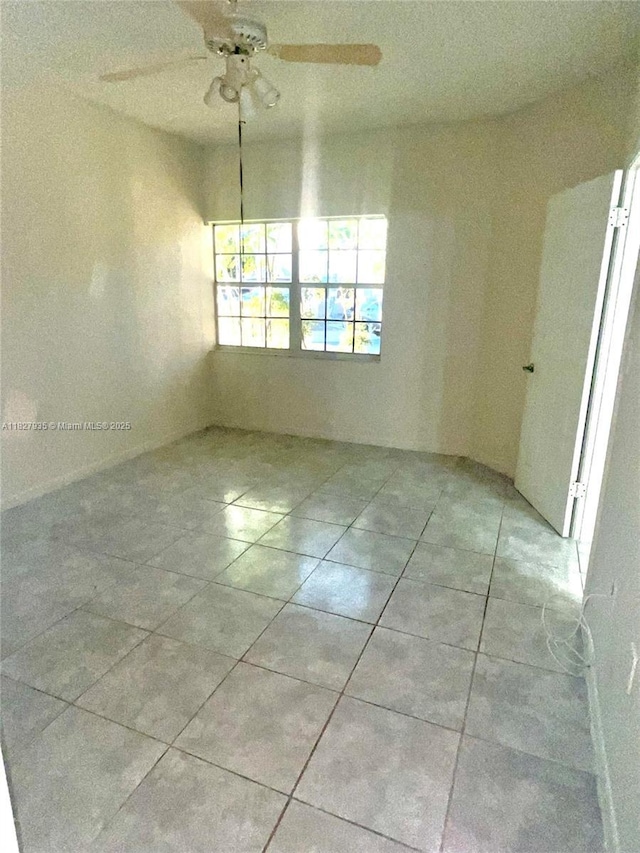 2331 NW 96th Ter Unit 17F, Pembroke Pines, FL 33024 - tiled spare room with ceiling fan
