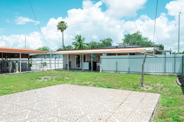 90 E 41st St, Hialeah, FL 33013 - back of property featuring a patio
