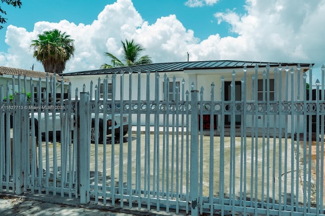 90 E 41st St, Hialeah, FL 33013 - gate with a fenced front yard