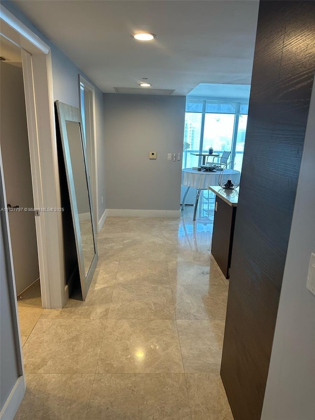 495 Brickell Ave Unit 5211, Miami, FL 33131 - hallway featuring baseboards