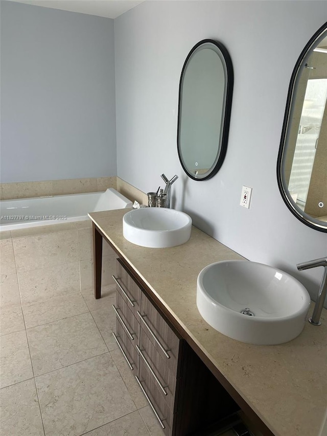 495 Brickell Ave Unit 5211, Miami, FL 33131 - bathroom with double vanity, tiled bath, and tile patterned flooring