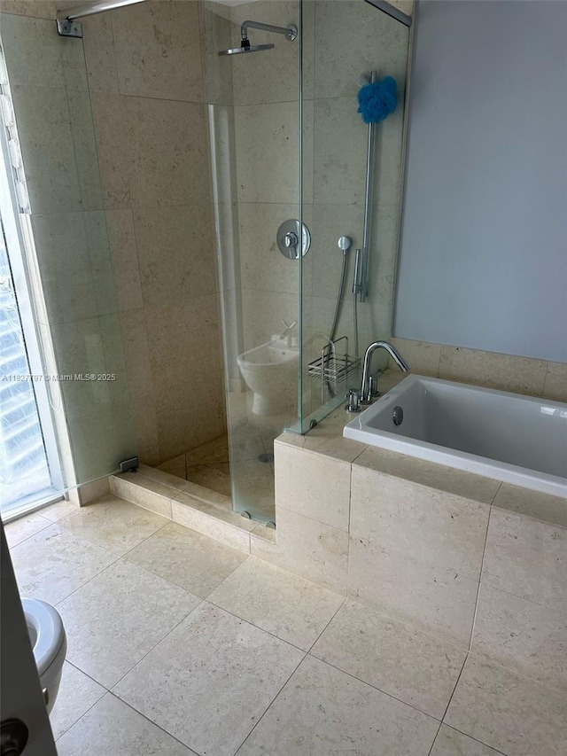 495 Brickell Ave Unit 5211, Miami, FL 33131 - full bath with tile patterned floors, a stall shower, and a bath