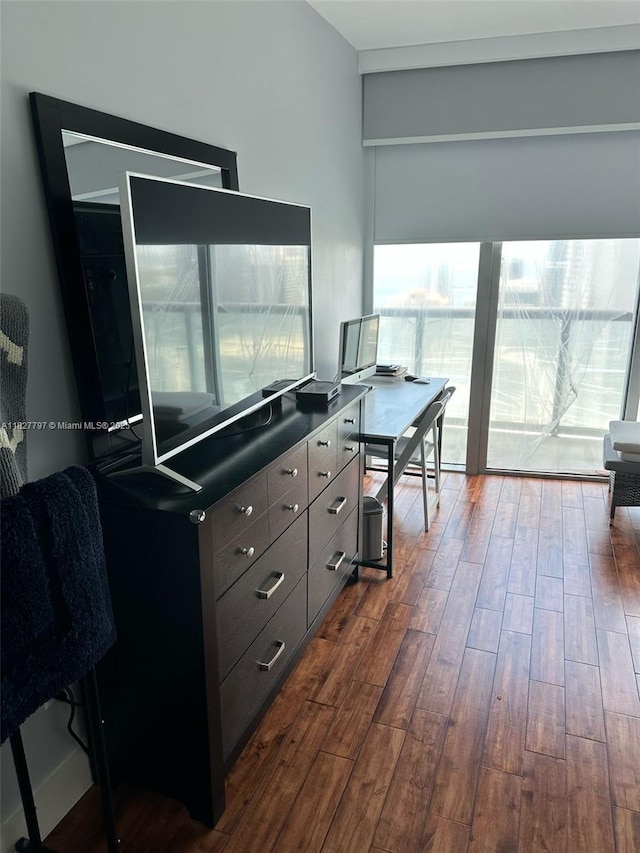 495 Brickell Ave Unit 5211, Miami, FL 33131 - home office with dark wood-type flooring