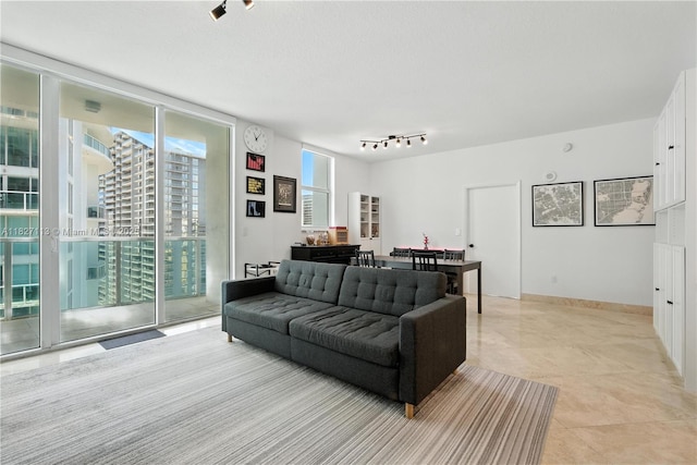 31 SE 5th St Unit 4021, Miami, FL 33131 - living area featuring light tile patterned floors and rail lighting