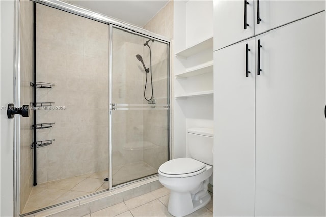 31 SE 5th St Unit 4021, Miami, FL 33131 - bathroom featuring a shower stall and tile patterned flooring