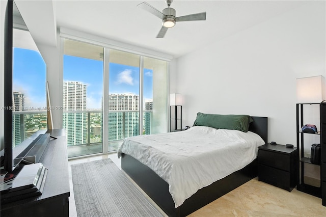 31 SE 5th St Unit 4021, Miami, FL 33131 - bedroom featuring floor to ceiling windows, access to exterior, and ceiling fan
