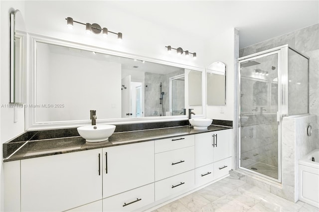 31 SE 5th St Unit 4021, Miami, FL 33131 - full bathroom featuring double vanity, a shower stall, and marble finish floors