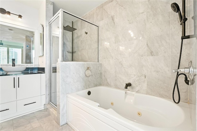 31 SE 5th St Unit 4021, Miami, FL 33131 - full bath with a stall shower, a jetted tub, vanity, and marble finish floors
