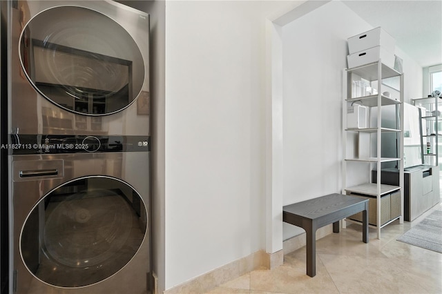 31 SE 5th St Unit 4021, Miami, FL 33131 - laundry room with stacked washer / drying machine and tile patterned floors