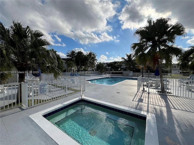 17425 NW 67th Pl Unit F-13, Hialeah, FL 33015 - community pool with a patio area and a hot tub