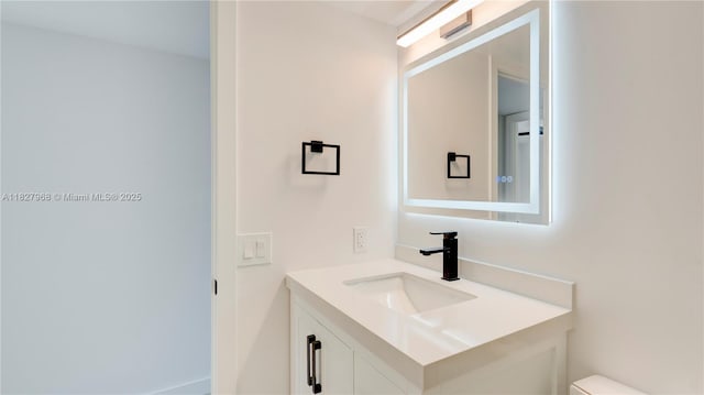 933 NE 24th Ave Unit 169, Hallandale Beach, FL 33009 - bathroom featuring vanity and toilet