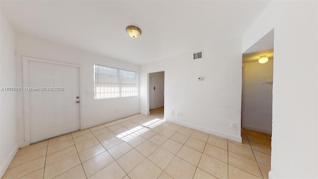 1190 NW 65th St, Miami, FL 33150 - foyer entrance with light tile patterned floors