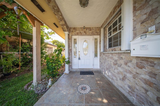 1115 NE 1st Ct Unit A, Hallandale Beach, FL 33009 - entrance to property with stone siding and covered porch