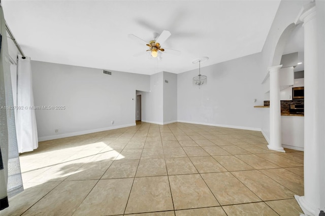 1115 NE 1st Ct Unit A, Hallandale Beach, FL 33009 - spare room featuring ceiling fan, light tile patterned floors, and arched walkways