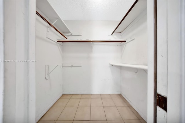 1115 NE 1st Ct Unit A, Hallandale Beach, FL 33009 - walk in closet with light tile patterned floors