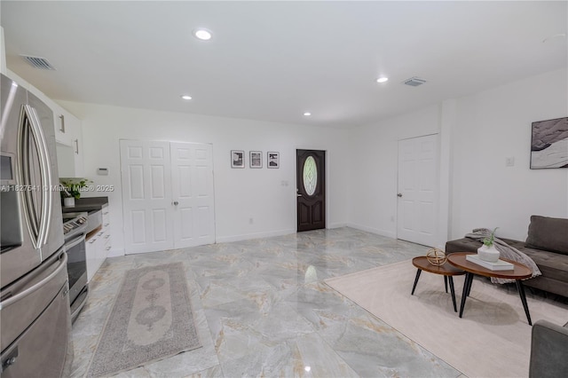 2125 SW 26th St, Miami, FL 33133 - entrance foyer featuring light marble finish flooring and recessed lighting