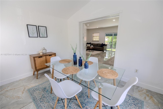 2125 SW 26th St, Miami, FL 33133 - dining room featuring baseboards and lofted ceiling