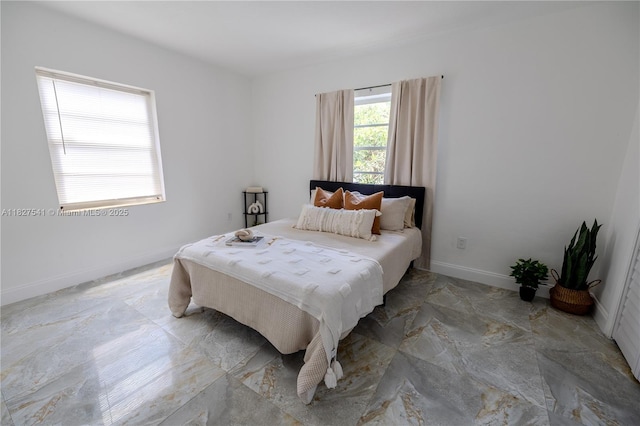 2125 SW 26th St, Miami, FL 33133 - bedroom featuring light marble finish floors and baseboards
