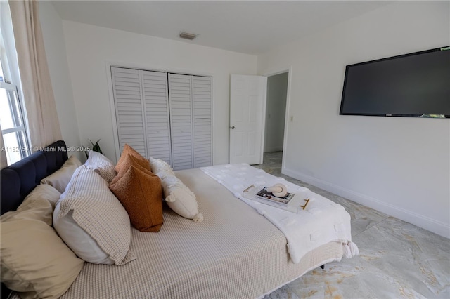 2125 SW 26th St, Miami, FL 33133 - bedroom with a closet and baseboards