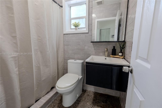2125 SW 26th St, Miami, FL 33133 - bathroom featuring tile walls and vanity