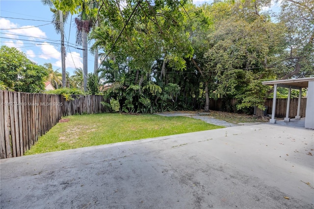 2125 SW 26th St, Miami, FL 33133 - fenced backyard featuring a patio