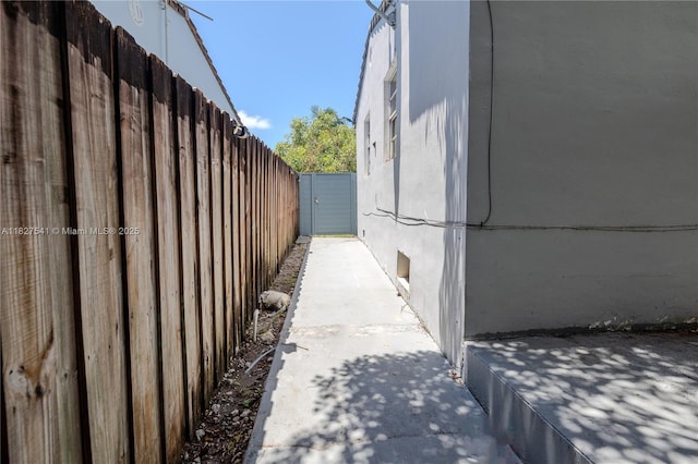 2125 SW 26th St, Miami, FL 33133 - view of side of home with a patio area