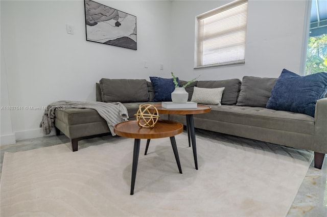 2125 SW 26th St, Miami, FL 33133 - living room with baseboards and concrete flooring